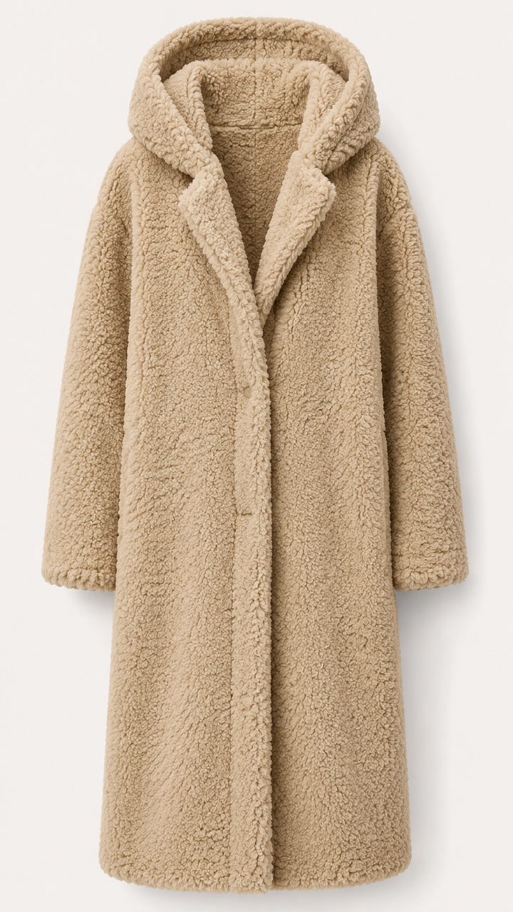 Versatile women's long winter coat with hood, ideal for layering and staying cozy in cold weather.
