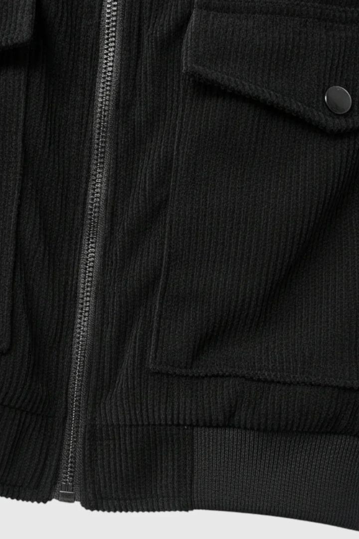 Relaxed fit men's black corduroy jacket, a stylish & versatile button-up for casual spring & fall wear.