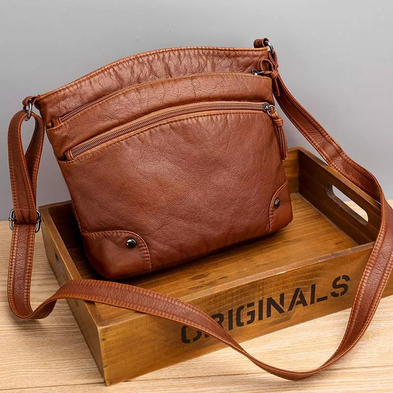 Stylish women's brown genuine leather shoulder bag, a durable and chic accessory perfect for daily essentials.