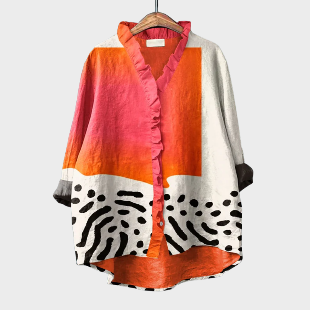 Women's flowy summer blouse with artistic print. Elegant long-sleeve top for casual chic warm weather everyday wear.