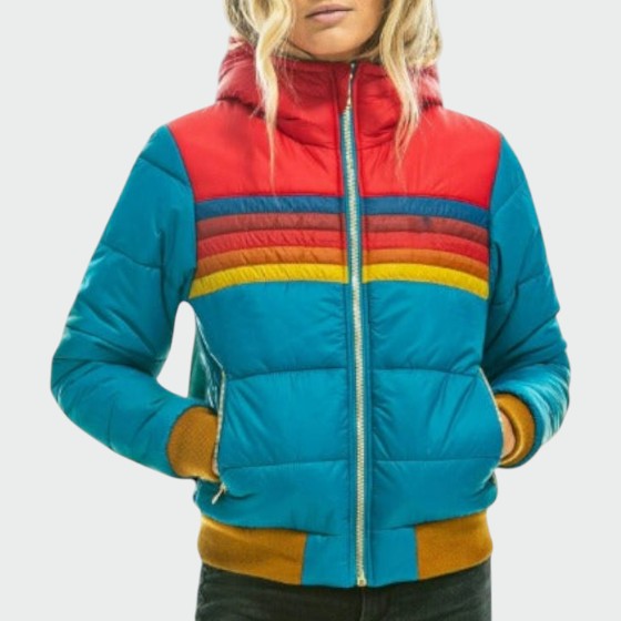 Stylish women's waterproof puffer jacket for cold weather, perfect for casual wear and travel.