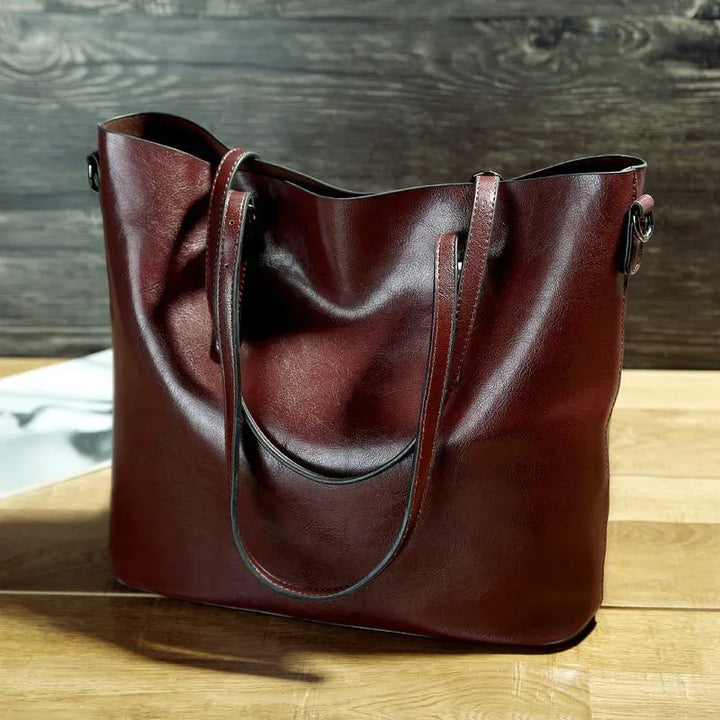 Classic vintage women's leather handbag, genuine leather shoulder bag for timeless fashion.