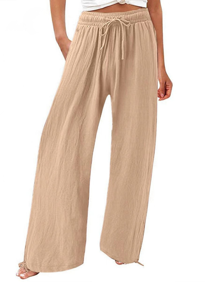 Chic women's wide-leg trousers featuring a high waist and drawstring, great for a versatile summer wardrobe.