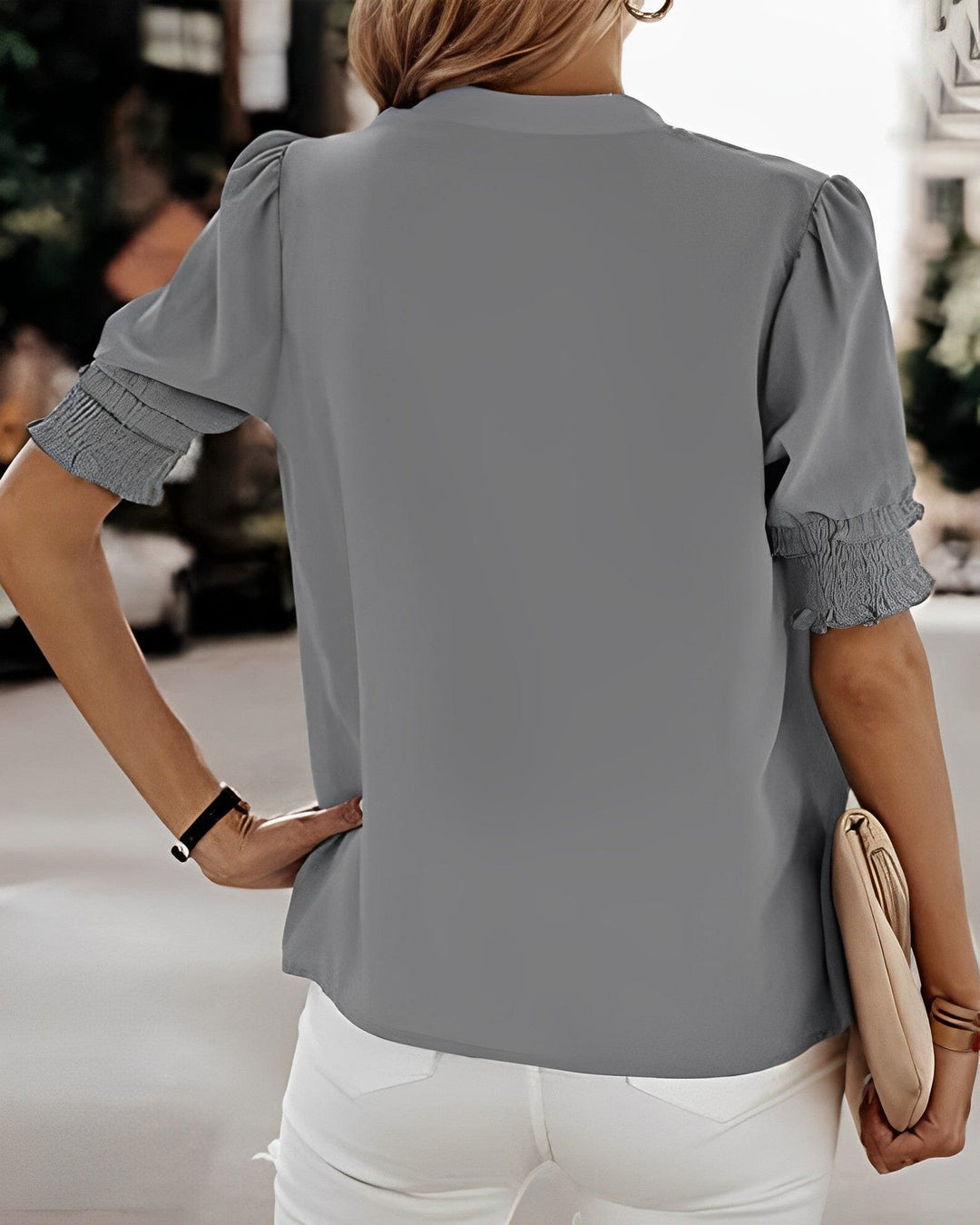 Refreshing women's V-neck puff sleeve top. Comfortable short sleeve blouse for spring & summer style.