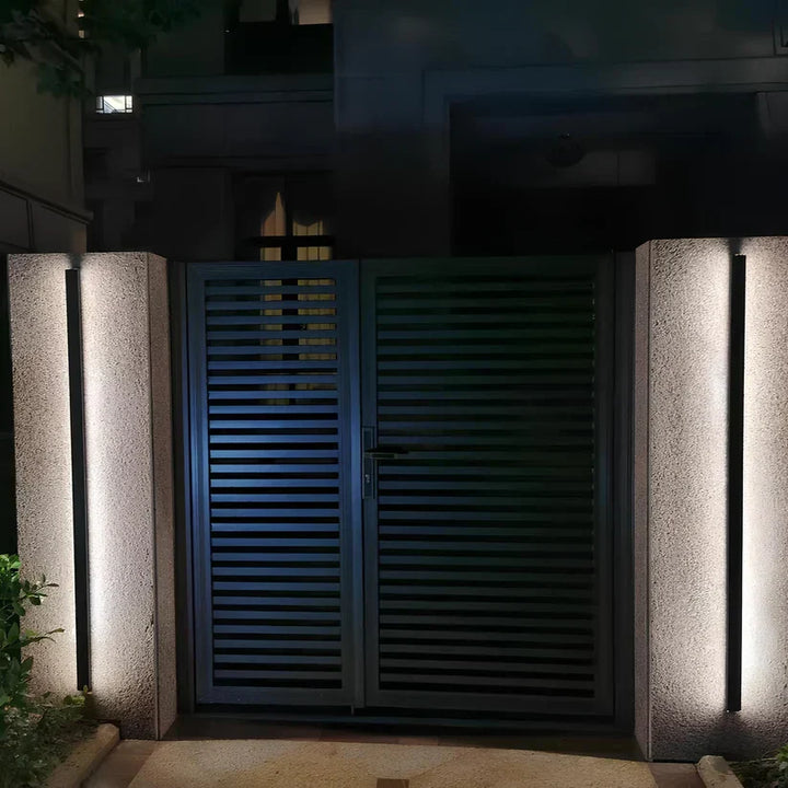 Modern LED outdoor wall sconce. Weatherproof exterior facade light, contemporary and energy-efficient for any home.