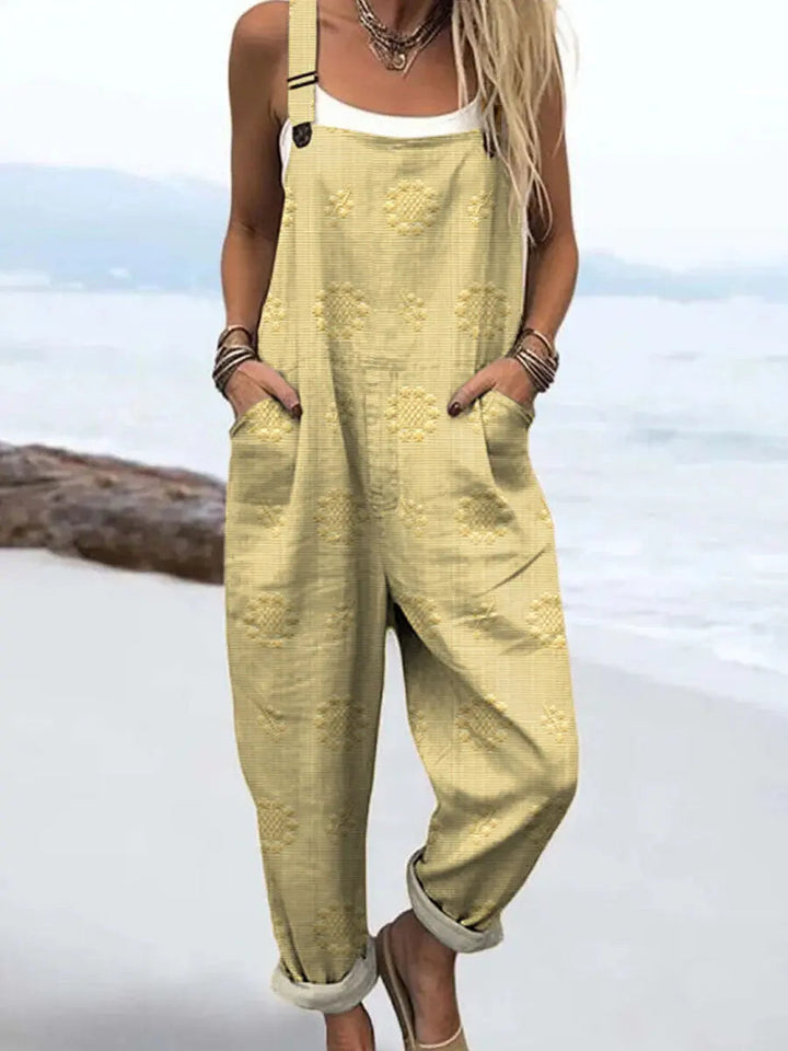 Chic women's wide-leg jumpsuit, adjustable straps, & a relaxed fit. Versatile for spring, summer, & casual occasions.