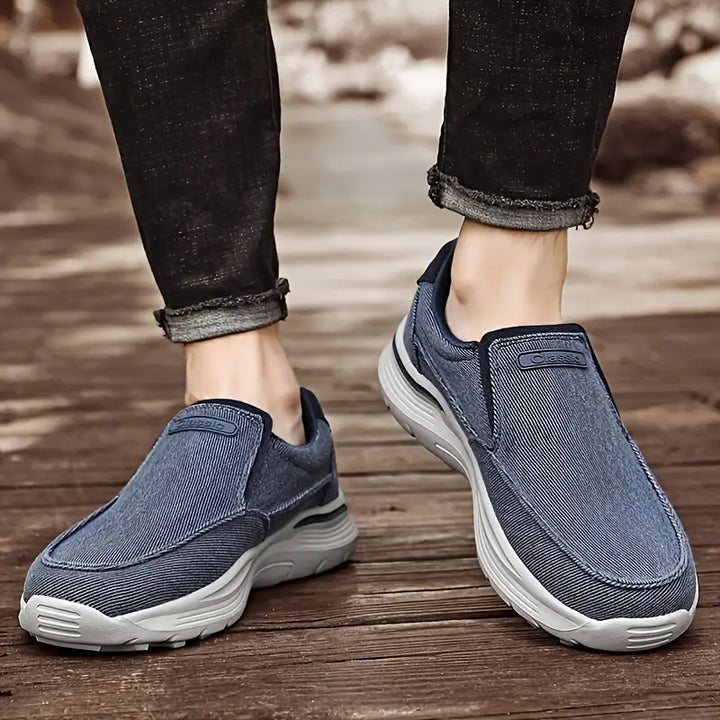 Light grey men's slip-on comfort loafers. Lightweight walking shoes, ideal for breathable casual wear.