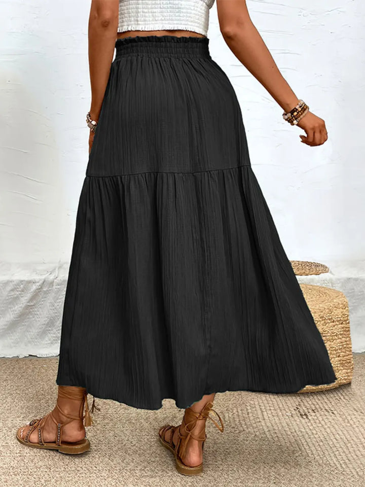 Lightweight women's summer midi skirt with tiered layers & a high slit for breezy comfort.