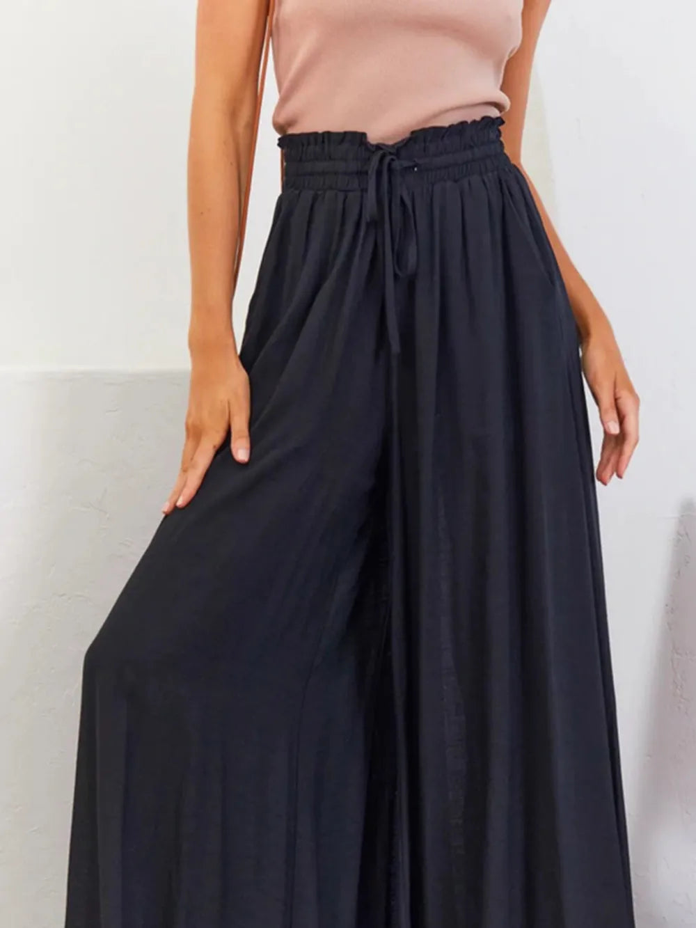 Breathable women's high waist wide leg pants, ensuring all-day comfort and flowy movement.