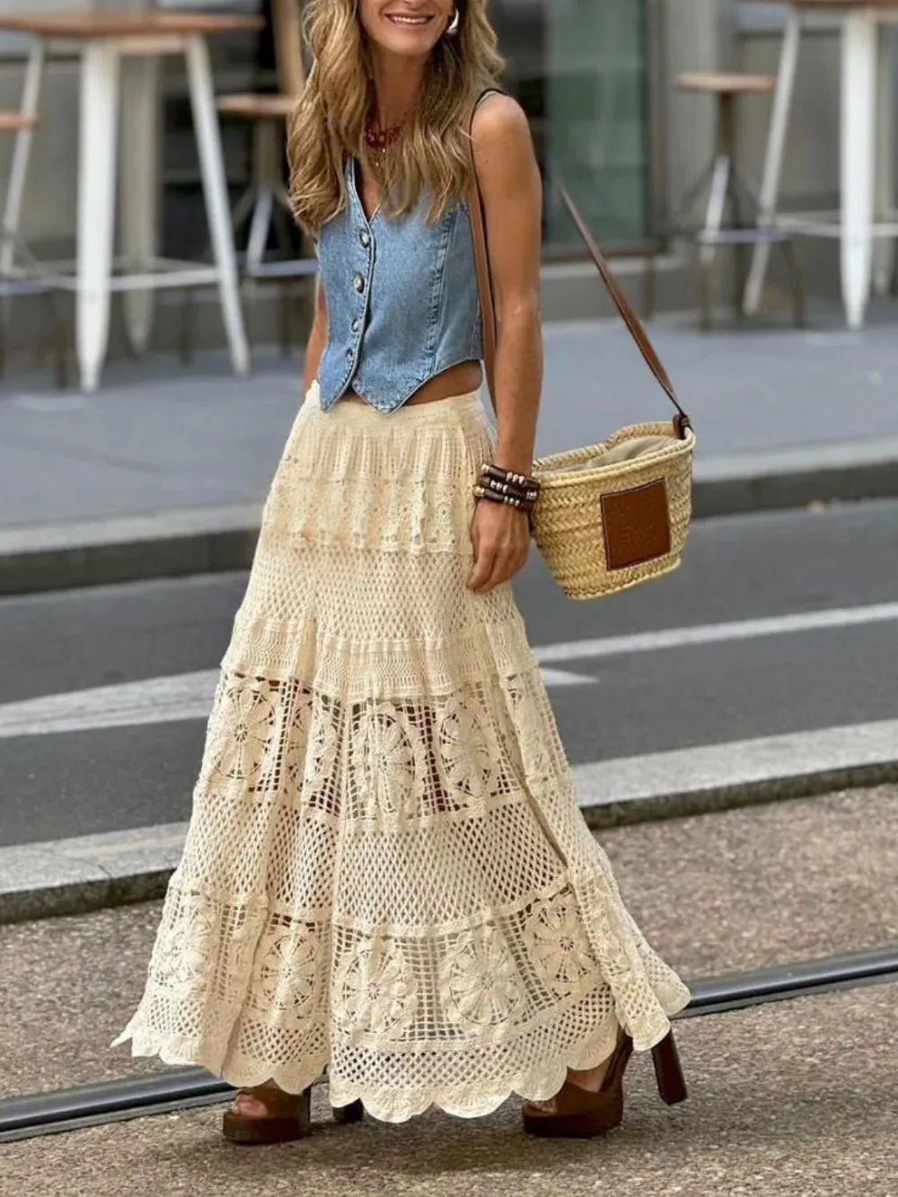 Long tiered women's crochet lace maxi skirt in a bohemian style, great for summer or vacation.