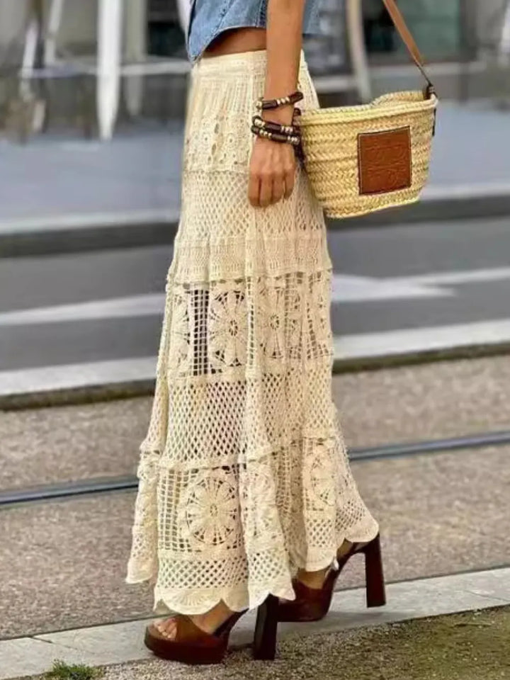 Flowy women's boho crochet lace maxi skirt, ideal for summer, beachwear & casual chic looks.