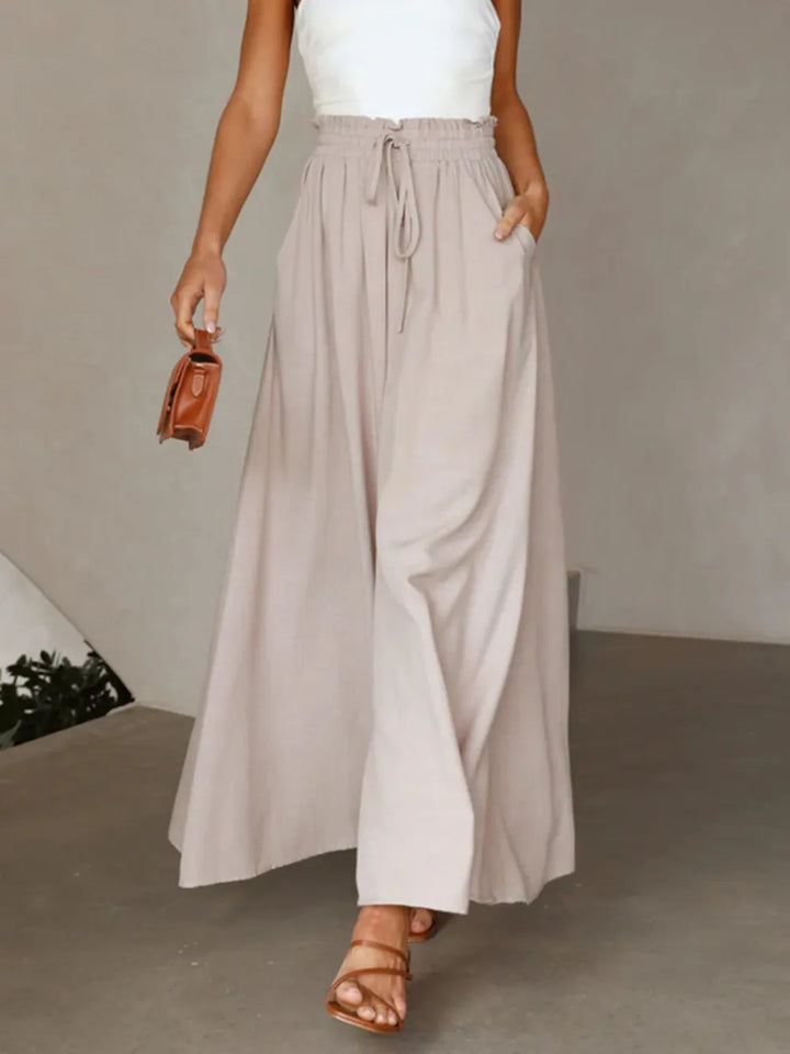 Sophisticated women's high waist wide leg trousers, elevating work or chic casual outfits.