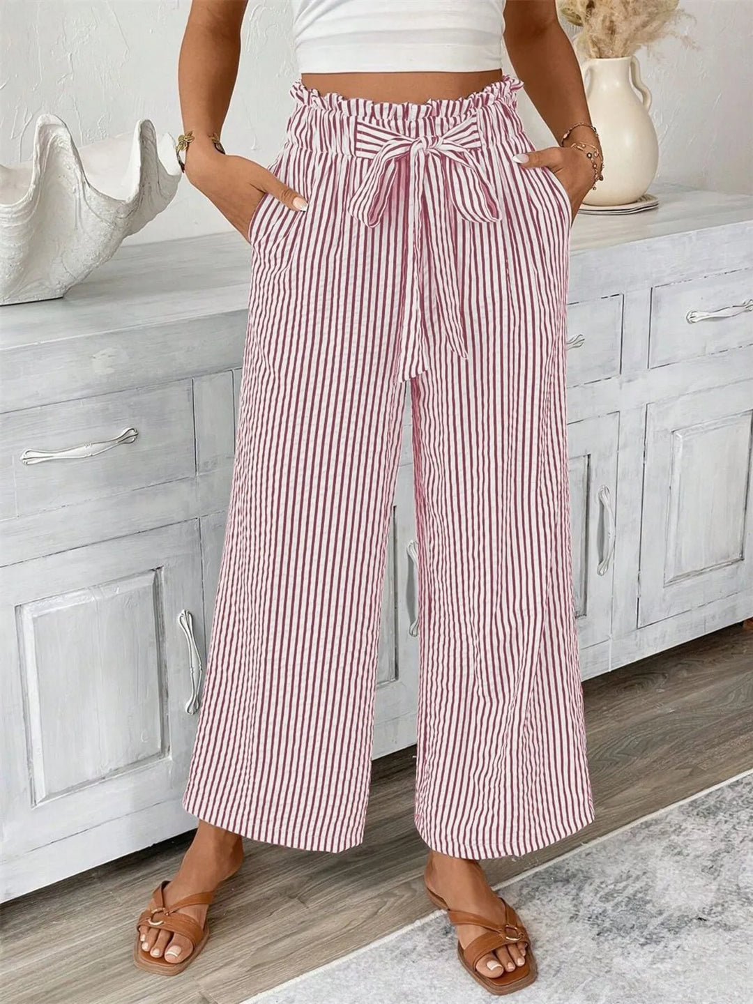 Elegant striped wide leg pants for women, designed with a chic paperbag tie waist.