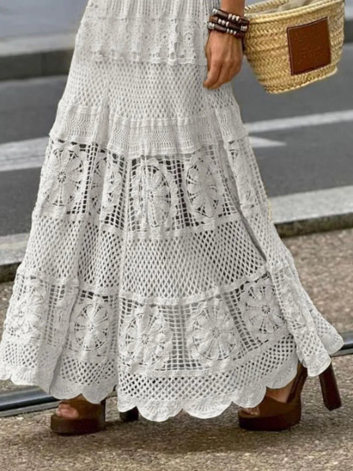 Stylish women's lace crochet maxi skirt, a flowy bohemian piece for summer, beach, or vacation outfits.