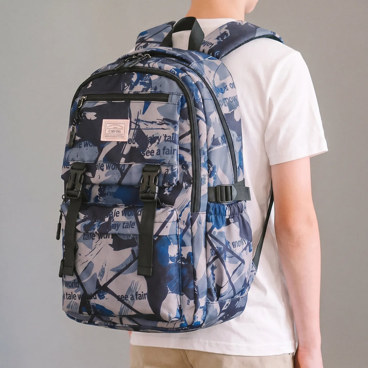 Kids' abstract print school backpack with organized storage, durable fabric for students.