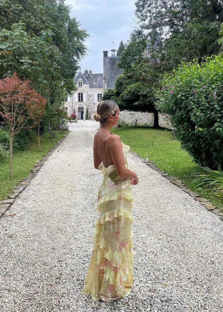 Chic women's floral maxi dress, flowy with ruffles & spaghetti straps. Ideal for summer formal occasions.