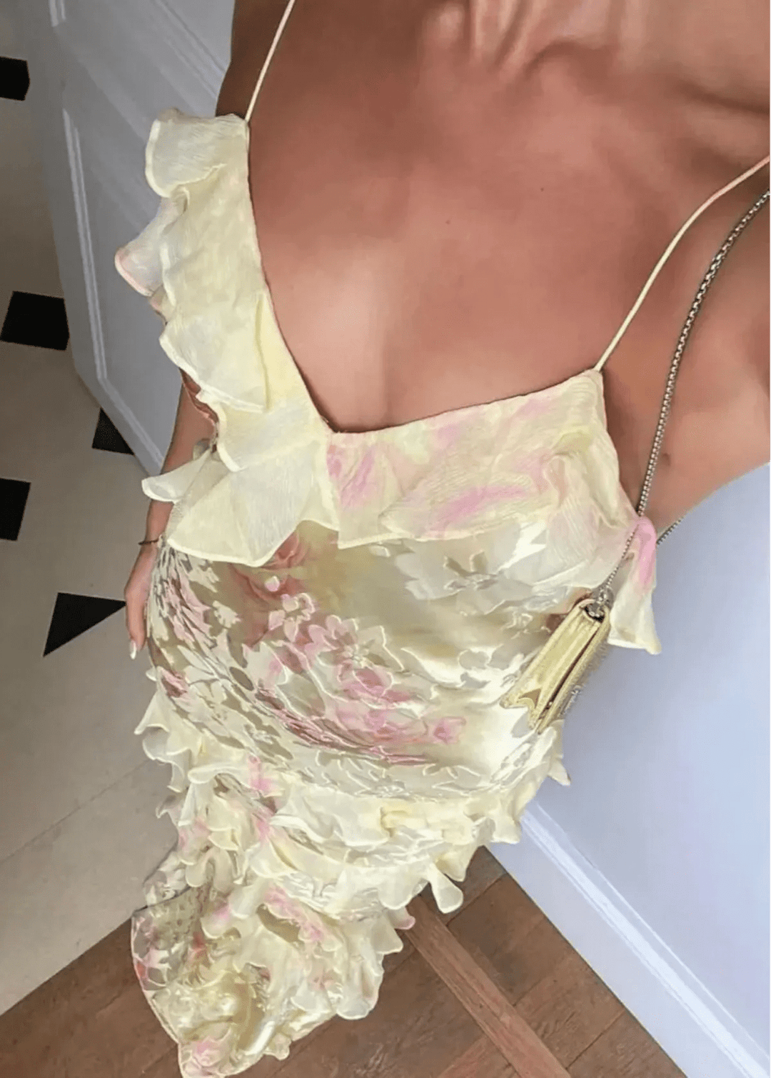 Stylish women's flowy floral maxi dress with ruffles; a chic and elegant choice for summer formal events.