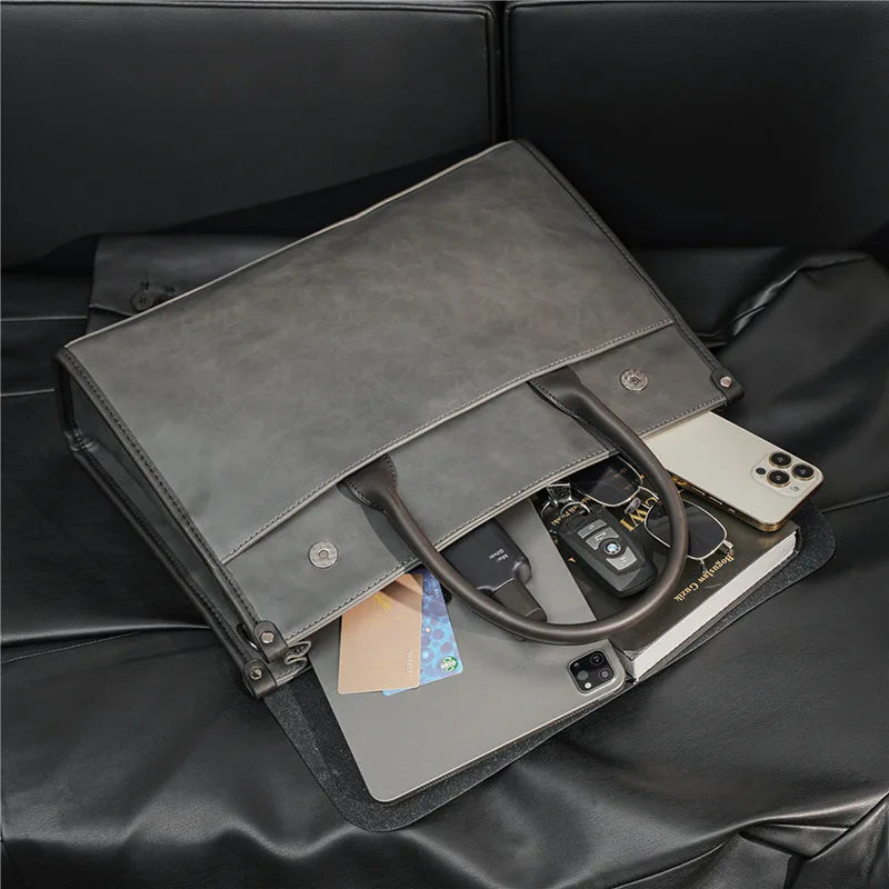 Men's vintage retro laptop briefcase. Professional business shoulder bag for secure device & document carry.
