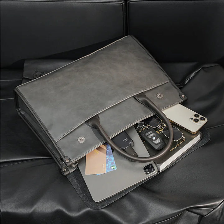 Men's vintage retro laptop briefcase. Professional business shoulder bag for secure device & document carry.