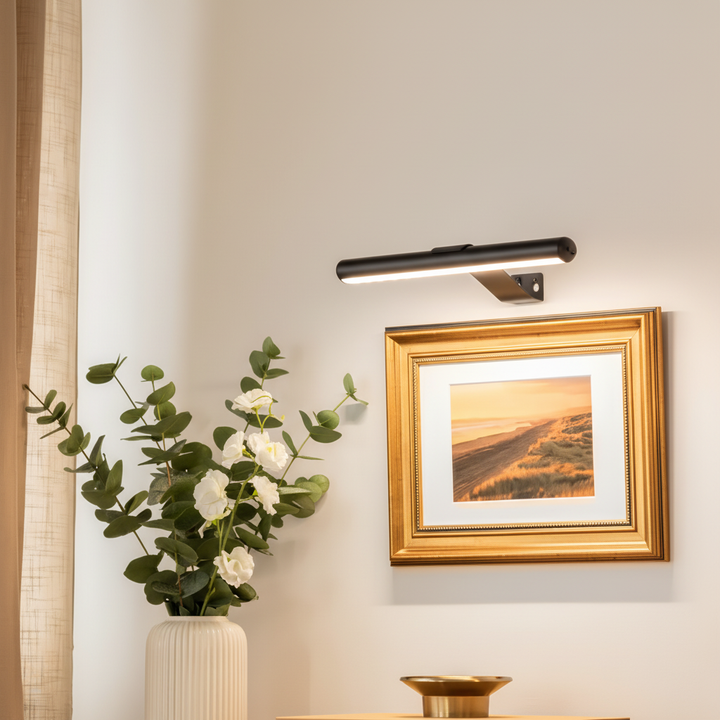 Rechargeable wireless LED picture light, dimmable for art and gallery display. Easy home decor wall lamp.