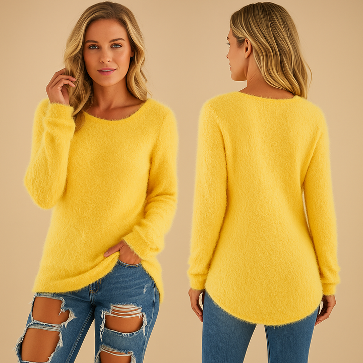 Versatile women's lightweight crew neck sweater styled for transitional fashion. Effortless layering top.