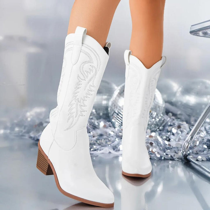 Elegant Charm women's western cowboy boots with pointed toe & comfortable block heel. Perfect stylish footwear.