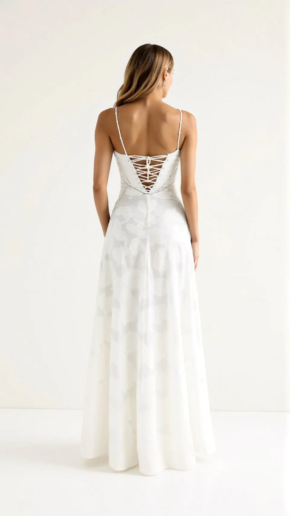 Vibrant floral print maxi dress for women, an elegant A-line wedding guest outfit.