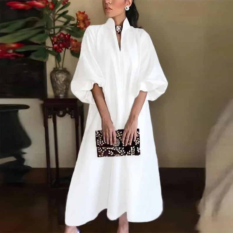 Elegant women's high neck maxi dress in a comfortable, sleeveless design, perfect for summer casual or evening wear.