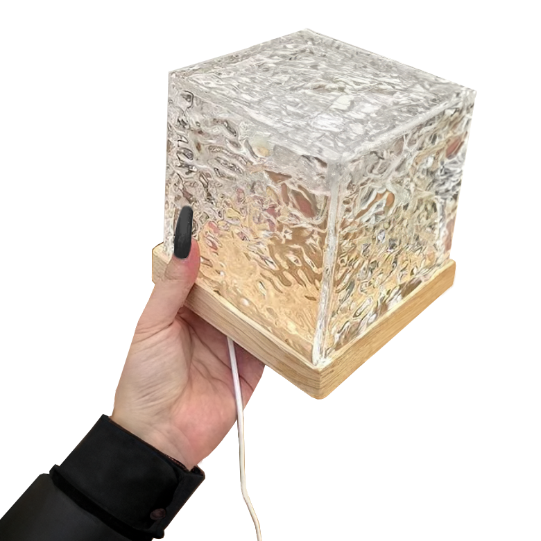 Compact Northern Lights projector lamp, a unique gift idea for creating soothing mood lighting and home decor.