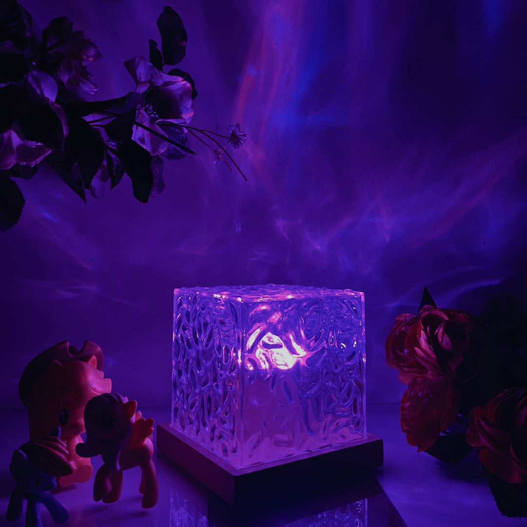 Aurora lamp projecting vibrant Northern Lights onto a ceiling, enhancing bedroom decor with mood lighting.