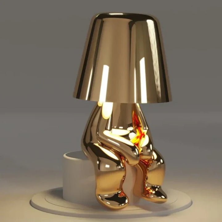 Touch control dimmable LED figurine lamp, portable & cordless for easy placement and ambiance.