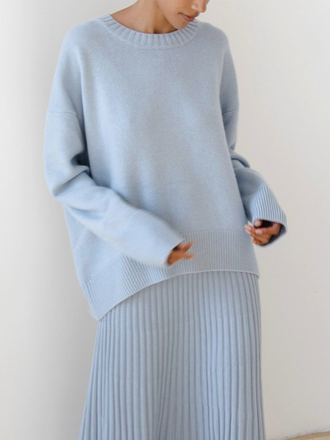 Soft knit style women's oversized crewneck sweater, offering ultimate comfort for casual everyday wear.