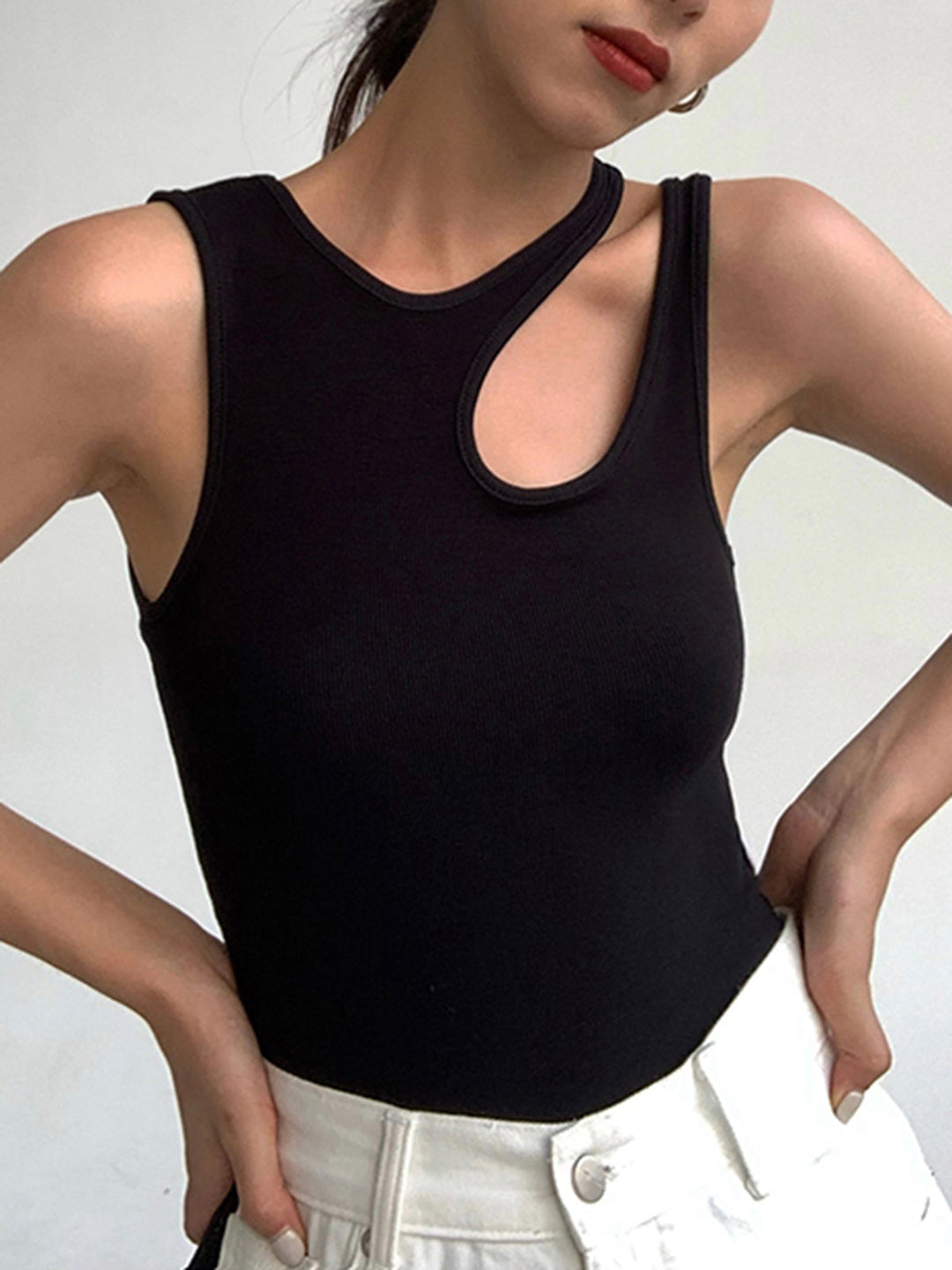 Versatile women's ribbed cutout tank top, a chic and trendy sleeveless piece for fashionable everyday summer wear.