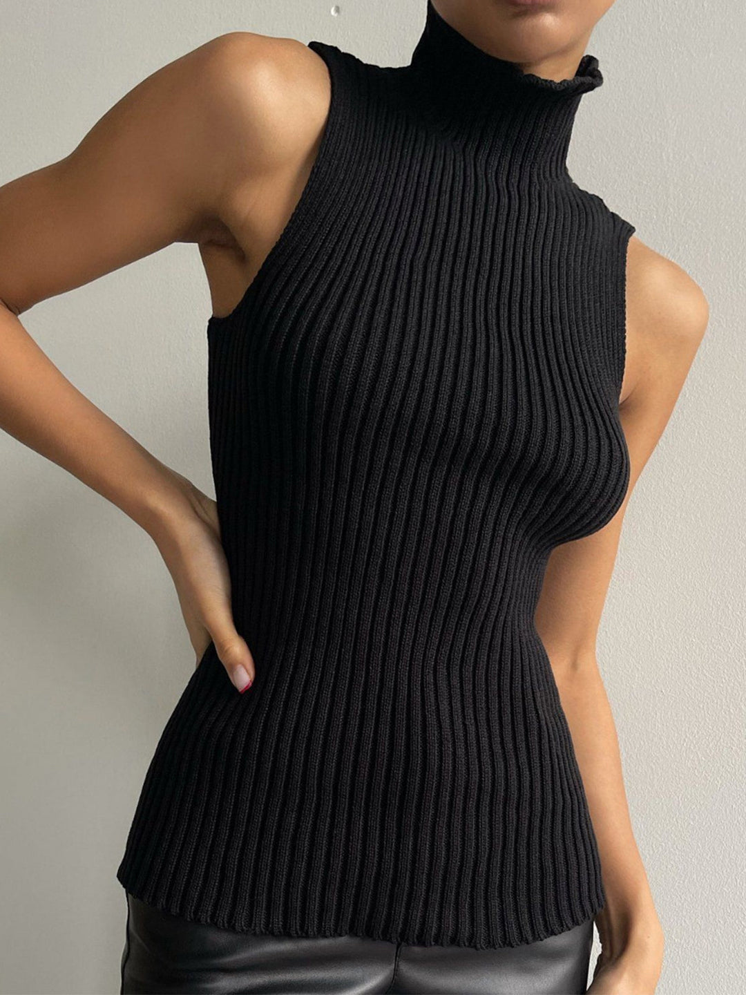 Comfortable women's ribbed sleeveless mock neck top, an essential for versatile everyday style.