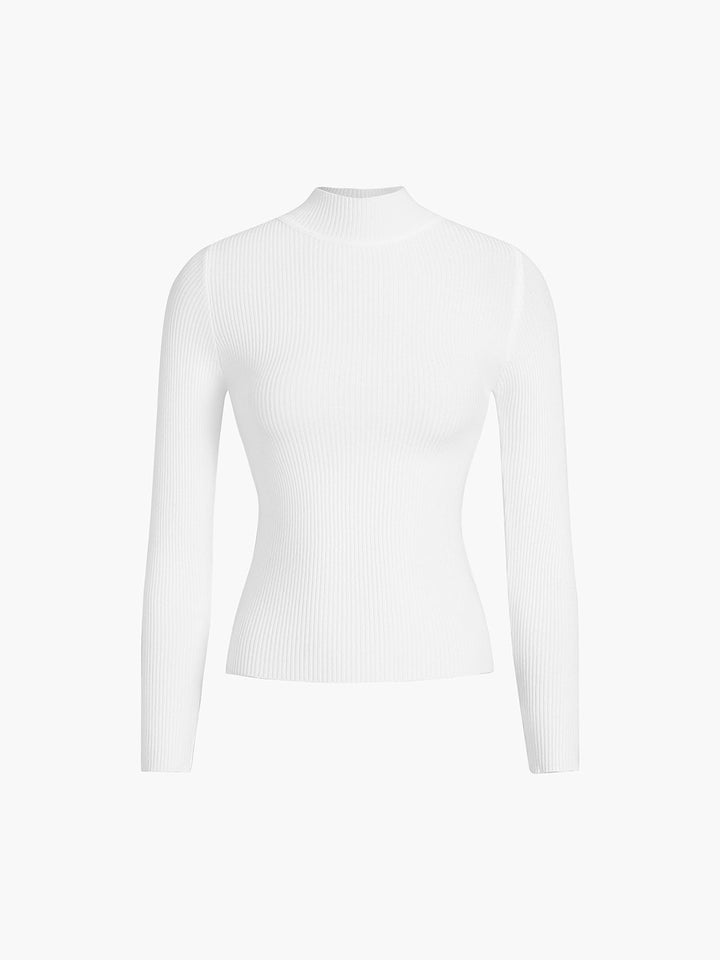 Women's ribbed high neck layering top in a stylish pose. Versatile long sleeve sweater for chic everyday fashion.