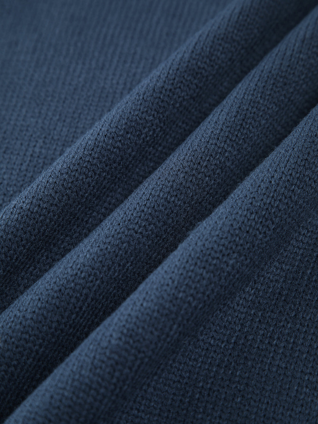 Warm women's mock neck ribbed sweater. A versatile long sleeve top for cozy winter fashion outfits.