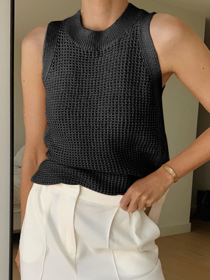 Chic women's hollow knit tank top with unique texture, versatile for summer casual wear or layered looks.
