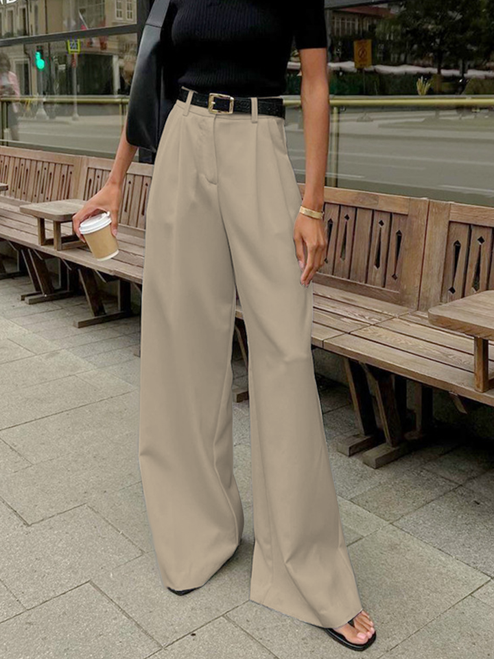 Modern women's high-rise wide-leg trousers, tailored for a flattering fit. Elegant and versatile fashion bottoms.