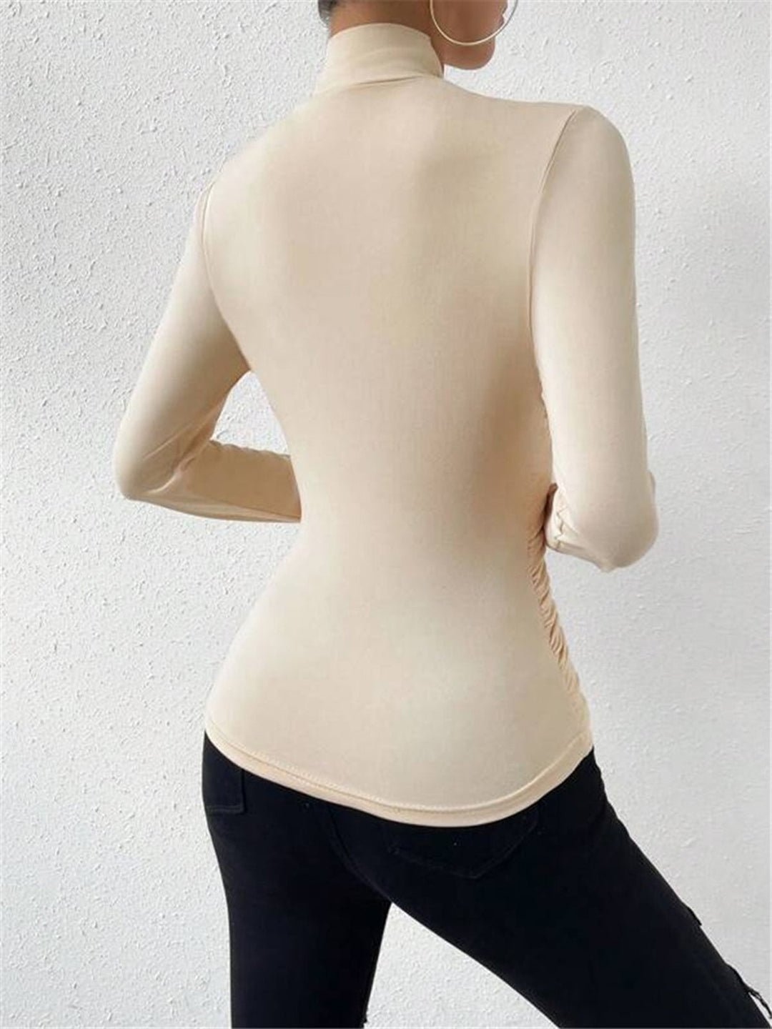 Chic beige draped crossover long sleeve top for women, ideal for both casual and formal elegant wear.