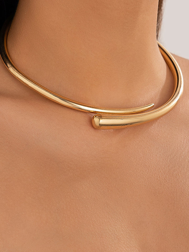Fashionable gold water drop open choker necklace, a unique women's jewelry piece with elegant minimalist design.