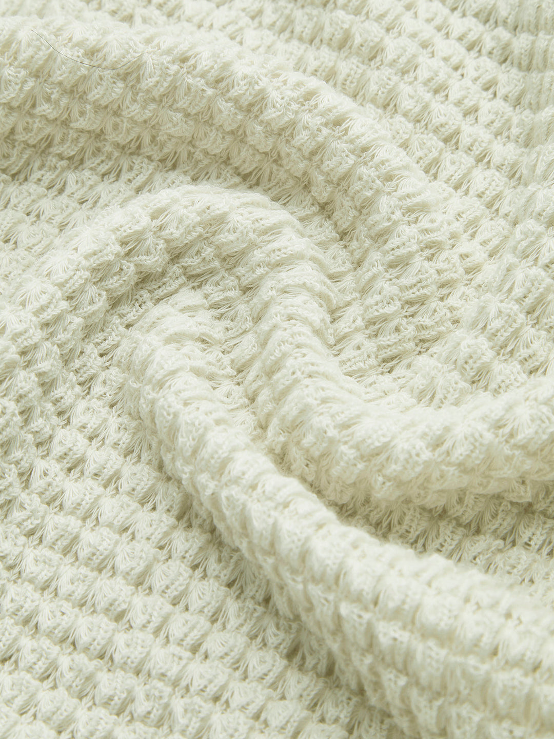 Stay cozy in this women's waffle knit long sleeve top, designed for effortless style & winter comfort.