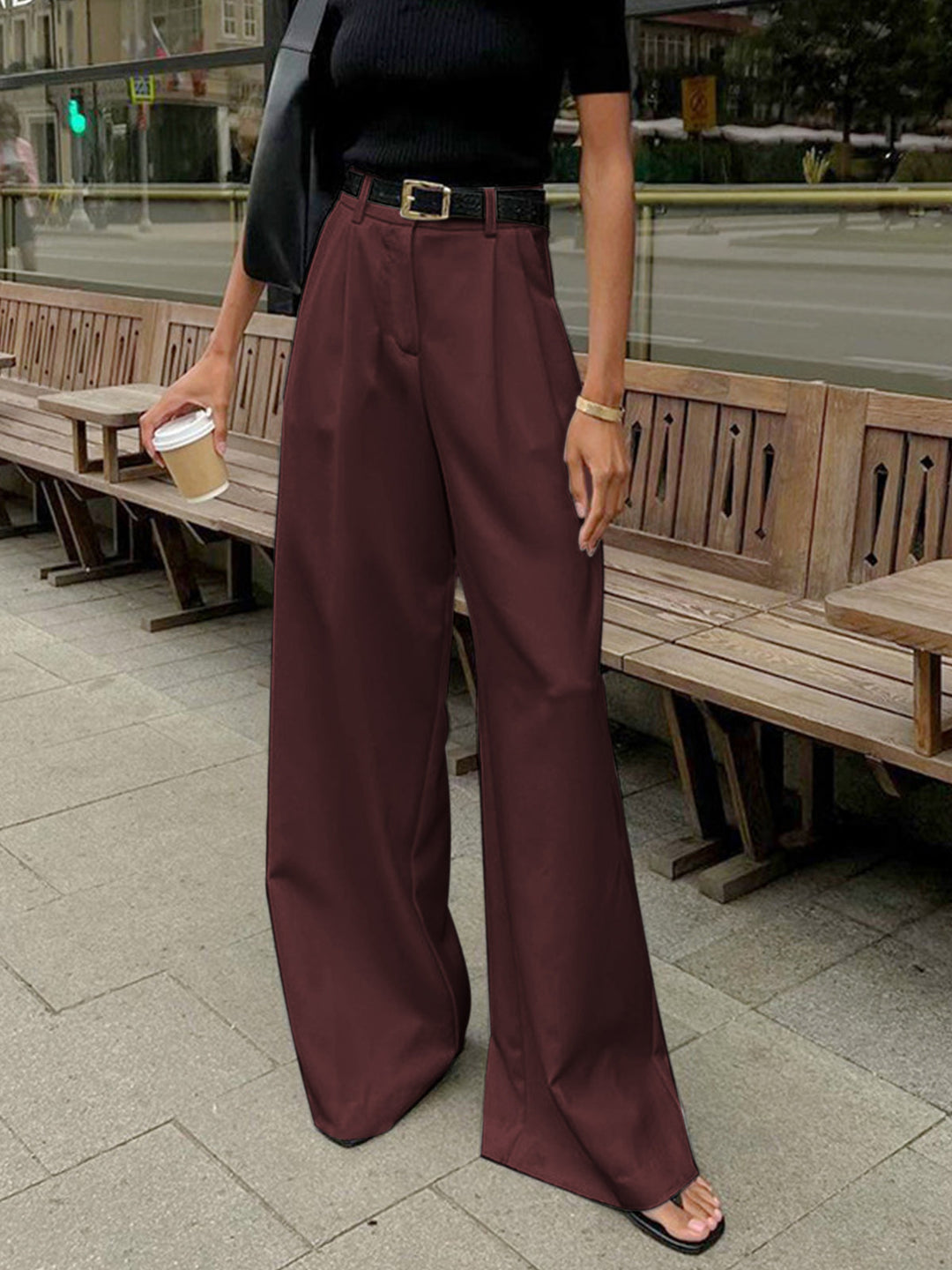 Professional women's tailored trousers, high-rise wide-leg design. Elegant and sophisticated office wear essentials.