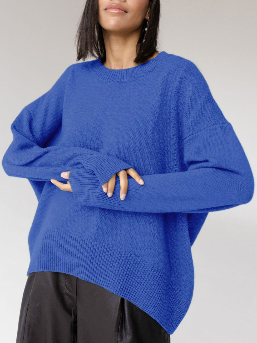 An essential women's oversized crewneck sweater, offering cozy comfort and stylish layering for fall & winter.