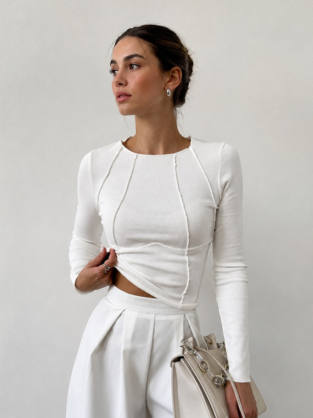 Women's ribbed long-sleeve top with contrast piping & crew neck, slim fit for everyday wear.