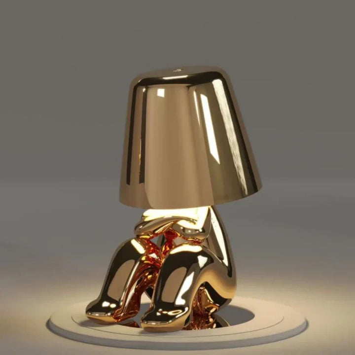 Portable LED figurine lamp, dimmable & cordless, perfect for any indoor space as artistic decor.