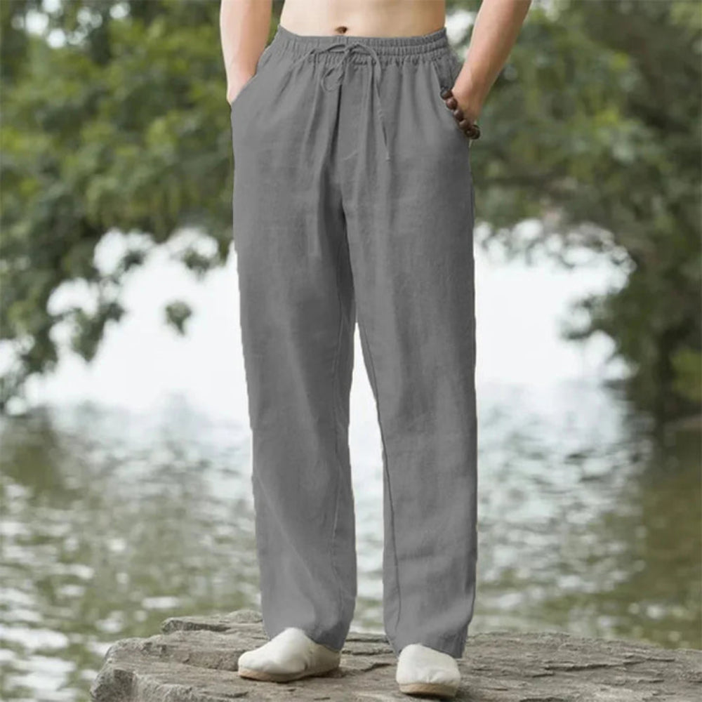Men's straight fit linen pants with elastic waist for ultimate summer comfort and beach style.