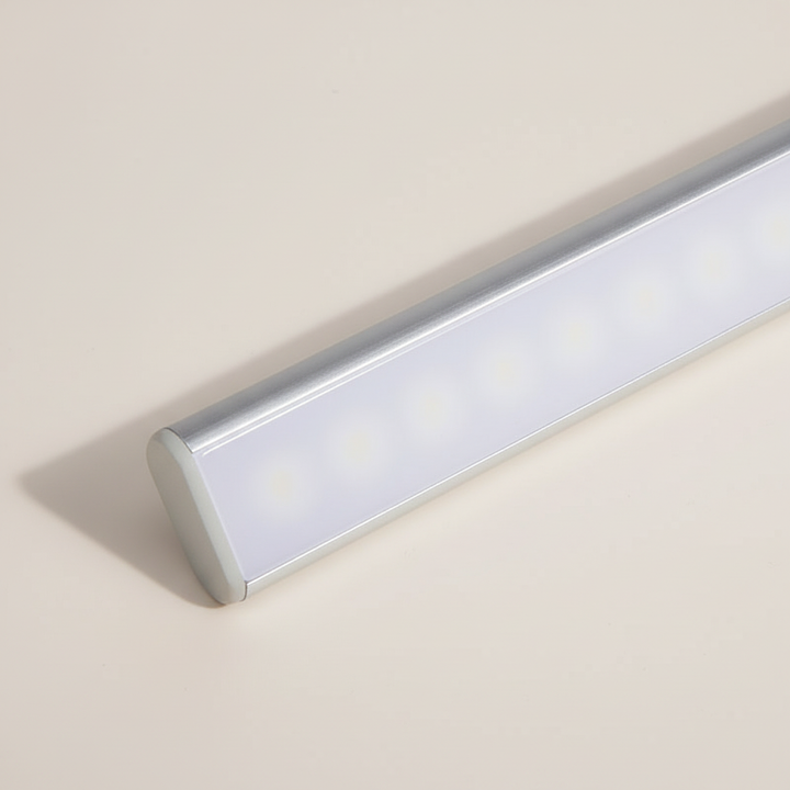 Rechargeable LED motion sensor light bar for stairs & hallways; enhances home safety with automatic, wireless lighting.