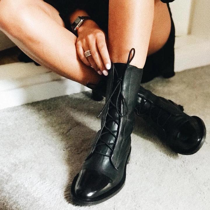 Luxurious women's contoured ankle boots. Elegant footwear for sophisticated style. Perfect for fall & winter fashion.