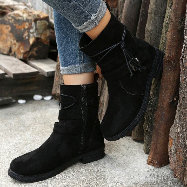 Easy-wear women's low heel ankle boots featuring a side zip and elegant buckle for comfort.