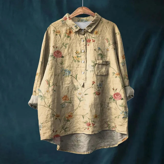 Lightweight & comfortable women's long-sleeve floral blouse. Machine washable summer top with vibrant print.